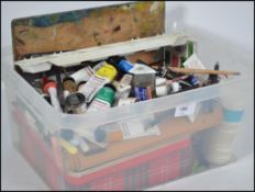 A collection of artists paints, water colours and