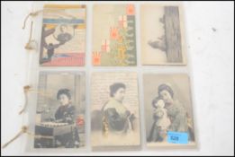 Japanese Postcards; A collection of 12x early 20th century oriental Japanese postcards. To include