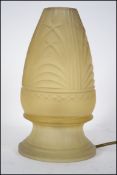 A 1930's Art Deco conical frosted yellow glass table lamp. Stunning moulded glass of heavy form with