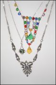 A good group of three silver necklace chains one having a rolo link chain with spring hoop clasp and