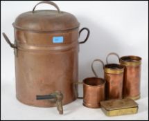 An early 20th century copper water urn fitted with