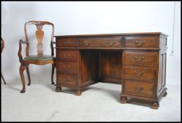 A very good antique Georgian style oak twin pedest