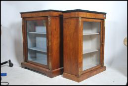 A near pair of Victorian walnut pier cabinets / di