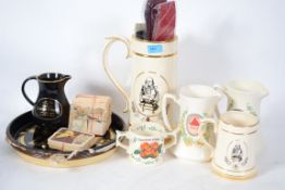 A collection of vintage 20th century breweriana items to include water jugs, steins ties etc