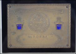 An unusual brass and enamel 20th century police award from the Police Athletic Association being set