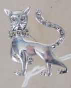 A silver and marcasite cat brooch