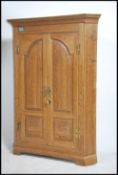An early 19th century Georgian solid oak hanging c