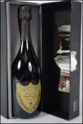 A cased bottle of Dom Perignon vintage 2000 champa