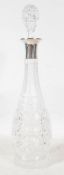 A silver collared cut glass decanter having a Sheffield assay mark rubbed makers mark