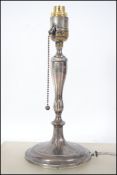 A rare large silver hallmarked table lamp. The lam