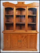 A Victorian country pine library bookcase cabinet
