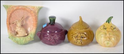 A collection of Sylvac style pickle jars, all with lids ( 3 total ) together with a large Sylvac