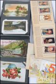 A vintage postcard album containing early 20th century verse postcards together with a cigarette