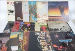 A collection of vinyl long play albums and 12