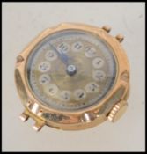 A 9ct gold ladies cocktail / dress watch having a Swiss movement. Rubbed hallmarks to inside of case