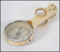 A set of vintage imitation folding ivory opera gla