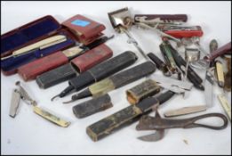 A collection of cut throat razors some in the orig