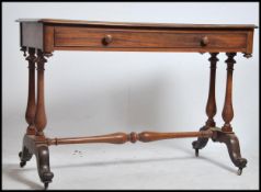 A good Victorian solid mahogany writing table desk. Raised on twin turned legs with splayed feet