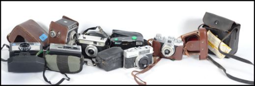 A collection of vintage 20th century 35mm cameras