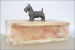 An early 20th century veined onyx table top cigare