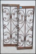 A pair of cast iron / wrought metal architectural