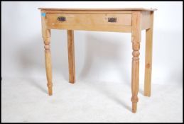 A Victorian country pine writing table desk being