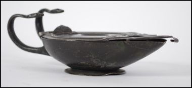 A 19th century  Art Nouveau hand held oil lamp hav