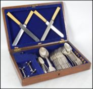 A good group of Walker and Hall silver plated cutlery to include table forks, table spoons, tea
