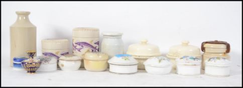 A collection of dressing table ceramic pots and cream jars etc to include Staffordshire chintz