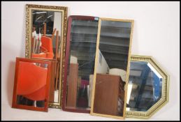 A collection of mirrors to include rectangular, he