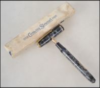 A boxed vintage 20th century Conway Stewart lever fill fountain / ink pen having a 14k k gold nib