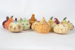 A good collection of retro 20th century studio pottery pickled onion lidded pots, beetroot lidded