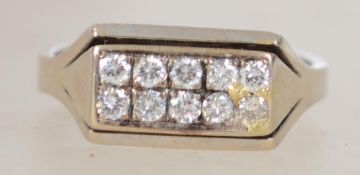 A ladies vintage 18ct white gold and diamond ring having channel set 10 stones totalling approx