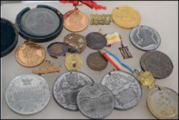 A collection of unusual commemorative medal coins