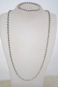 A 20th century hallmarked silver rope twist ladies necklace and matching bracelet set. Chain