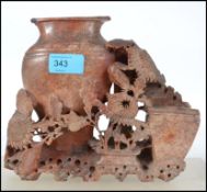 A 20th century Chinese soapstone brush pot of carv