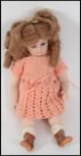 A good quality collectors porcelain doll of small