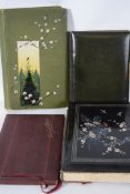 A collection of 4 early 20th century postcard / photograph albums to include ebonised Japanese
