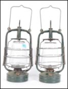 A near pair of vintage mid century cast green meta