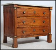 A 19th century French Empire chestnut / oak & marb