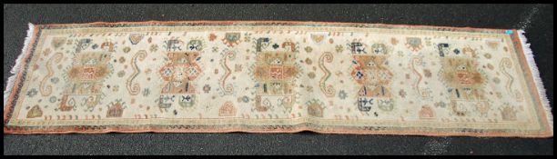 A good wool hall runner   having a tribal design d
