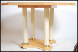 A good 20th century biedermeier birds eye maple pedestal centre - dining table. Of Octagonal form