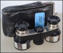 A pair of vintage leather purse cased mother of pe