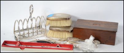 A collection of silver backed clothes hair brushes
