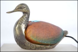 A 20th century table lamp in the form of a duck ha