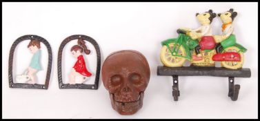 A collection of 3x vintage style cast iron items to include hangers etc. Measurements differ in