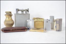 A collection of vintage lighters to include over s