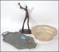 An Art Nouveau twin handled pewter pin tray being