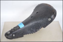 A vintage early to - mid 20th century black leathe