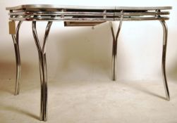 A mid century large American chrome and formica to